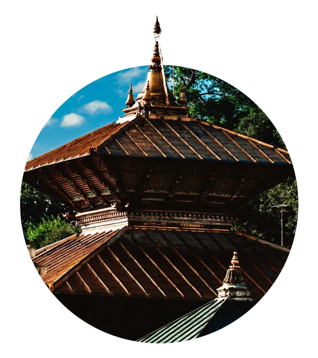 Golden spire of the Pashupatinath pagoda rising above its copper roofs